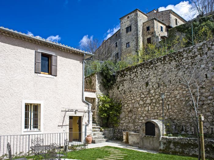 The perimeter wall with a view of the village